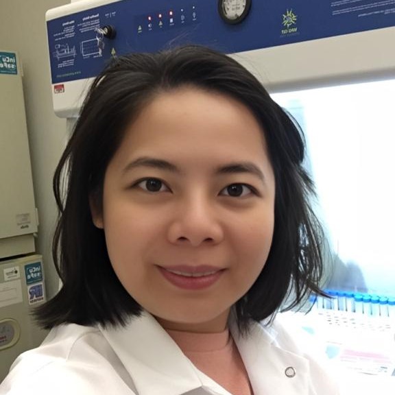 Hien Anh Bruno wearing a lab coat in front of scientific equipment